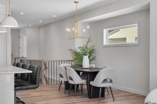 88 Sunrise Heath, Cochrane, AB - Indoor Photo Showing Dining Room