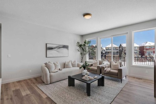 88 Sunrise Heath, Cochrane, AB - Indoor Photo Showing Living Room