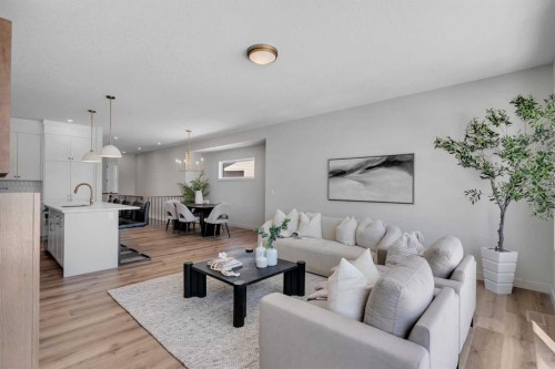 88 Sunrise Heath, Cochrane, AB - Indoor Photo Showing Living Room