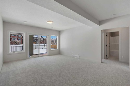 88 Sunrise Heath, Cochrane, AB - Indoor Photo Showing Other Room