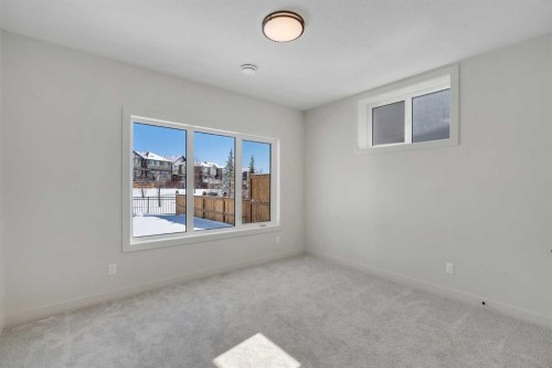 88 Sunrise Heath, Cochrane, AB - Indoor Photo Showing Other Room