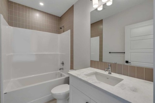 88 Sunrise Heath, Cochrane, AB - Indoor Photo Showing Bathroom