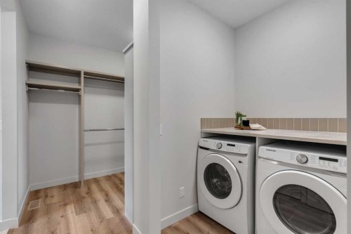 88 Sunrise Heath, Cochrane, AB - Indoor Photo Showing Laundry Room