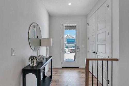 88 Sunrise Heath, Cochrane, AB - Indoor Photo Showing Other Room