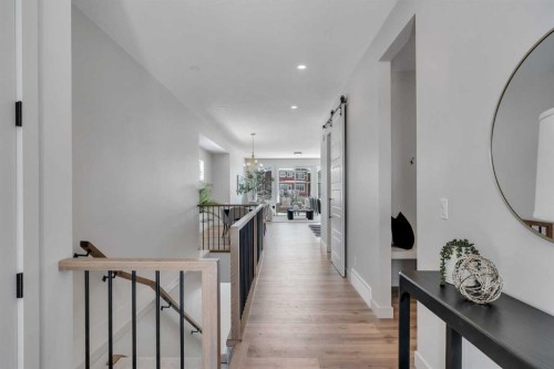 88 Sunrise Heath, Cochrane, AB - Indoor Photo Showing Other Room