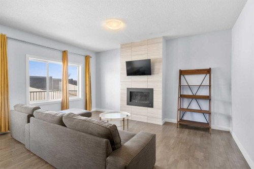 252 Nolanhurst Crescent Nw, Calgary, AB - Indoor Photo Showing Living Room With Fireplace