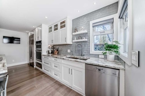 256 Riverside Mews Se, Calgary, AB - Indoor Photo Showing Kitchen With Upgraded Kitchen