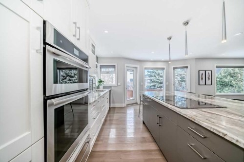 256 Riverside Mews Se, Calgary, AB - Indoor Photo Showing Kitchen With Upgraded Kitchen