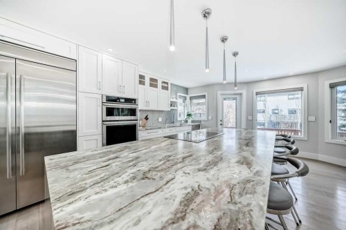 256 Riverside Mews Se, Calgary, AB - Indoor Photo Showing Kitchen With Upgraded Kitchen