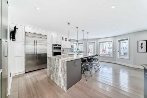 256 Riverside Mews Se, Calgary, AB - Indoor Photo Showing Kitchen With Upgraded Kitchen