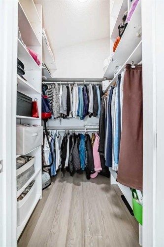 256 Riverside Mews Se, Calgary, AB - Indoor With Storage