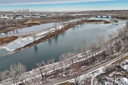 256 Riverside Mews Se, Calgary, AB - Outdoor With Body Of Water With View