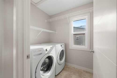 151 Heritage View, Cochrane, AB - Indoor Photo Showing Laundry Room