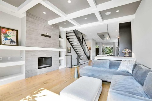 235 11 Avenue Ne, Calgary, AB - Indoor Photo Showing Other Room With Fireplace