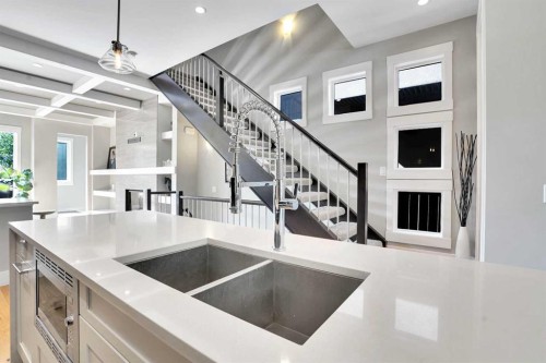235 11 Avenue Ne, Calgary, AB - Indoor Photo Showing Kitchen With Double Sink