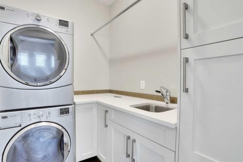 235 11 Avenue Ne, Calgary, AB - Indoor Photo Showing Laundry Room