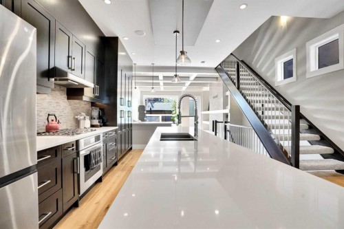235 11 Avenue Ne, Calgary, AB - Indoor Photo Showing Kitchen With Double Sink With Upgraded Kitchen
