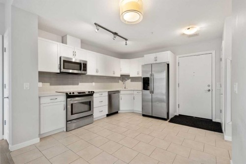 1903-1320 1 Street Se, Calgary, AB - Indoor Photo Showing Kitchen With Stainless Steel Kitchen