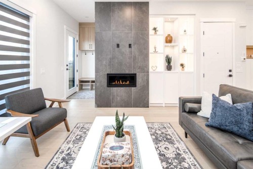 912 15 Avenue Ne, Calgary, AB - Indoor Photo Showing Living Room With Fireplace