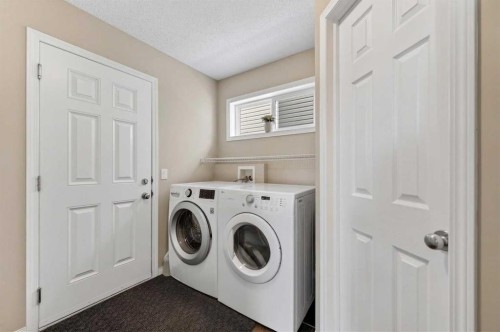 155 Morningside Circle Sw, Airdrie, AB - Indoor Photo Showing Laundry Room