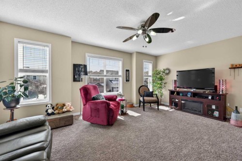 155 Morningside Circle Sw, Airdrie, AB - Indoor Photo Showing Living Room