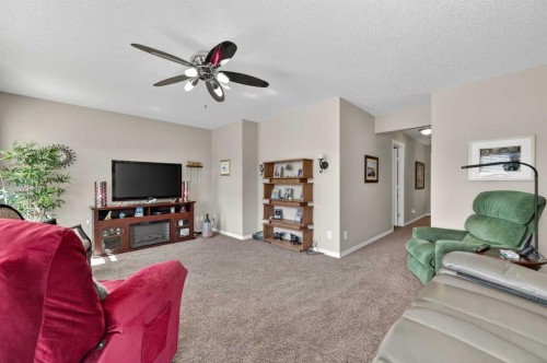 155 Morningside Circle Sw, Airdrie, AB - Indoor Photo Showing Living Room
