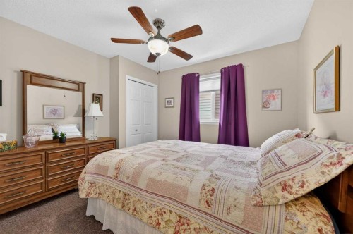 155 Morningside Circle Sw, Airdrie, AB - Indoor Photo Showing Bedroom