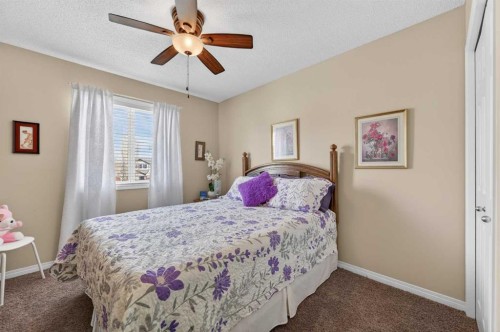 155 Morningside Circle Sw, Airdrie, AB - Indoor Photo Showing Bedroom