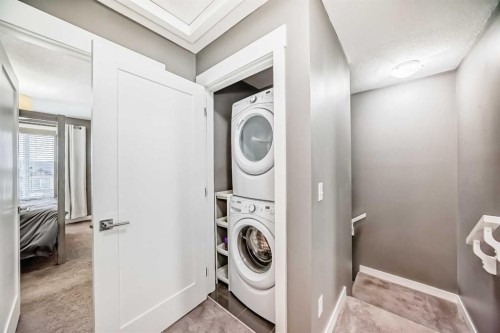 53-111 Rainbow Falls, Chestermere, AB - Indoor Photo Showing Laundry Room