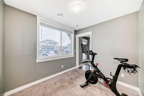 53-111 Rainbow Falls, Chestermere, AB - Indoor Photo Showing Gym Room