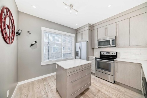 53-111 Rainbow Falls, Chestermere, AB - Indoor Photo Showing Kitchen
