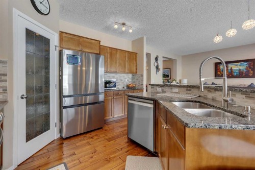 10 Evansbrooke Place Nw, Calgary, AB - Indoor Photo Showing Kitchen With Stainless Steel Kitchen With Double Sink