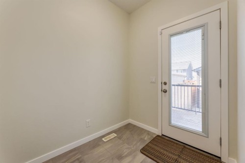 28 Masters Link Se, Calgary, AB - Indoor Photo Showing Other Room