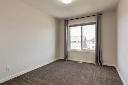 28 Masters Link Se, Calgary, AB - Indoor Photo Showing Other Room