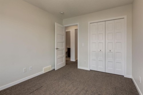 28 Masters Link Se, Calgary, AB - Indoor Photo Showing Other Room