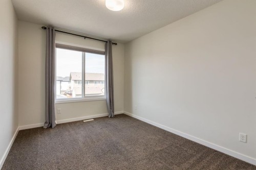 28 Masters Link Se, Calgary, AB - Indoor Photo Showing Other Room