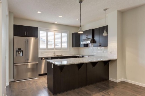 28 Masters Link Se, Calgary, AB - Indoor Photo Showing Kitchen With Upgraded Kitchen