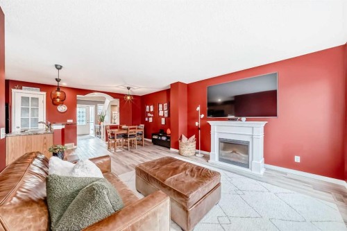 223 Auburn Bay Heights Se, Calgary, AB - Indoor Photo Showing Living Room With Fireplace