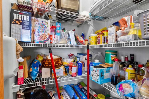 5107 42 Street, Olds, AB - Indoor With Storage