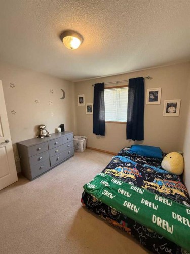 5107 42 Street, Olds, AB - Indoor Photo Showing Bedroom