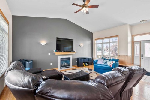 5107 42 Street, Olds, AB - Indoor Photo Showing Living Room With Fireplace