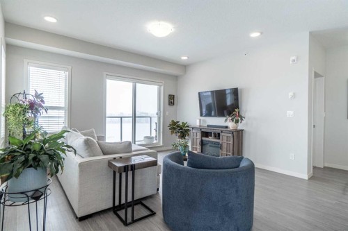 429-20 Seton Park Se, Calgary, AB - Indoor Photo Showing Living Room
