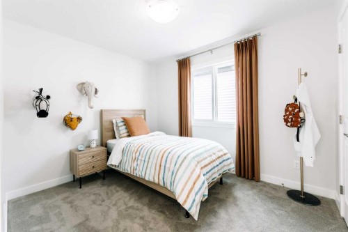 416 Ranch Gate, Strathmore, AB - Indoor Photo Showing Bedroom