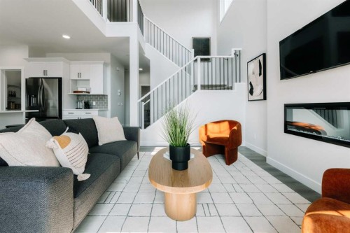 416 Ranch Gate, Strathmore, AB - Indoor Photo Showing Living Room With Fireplace