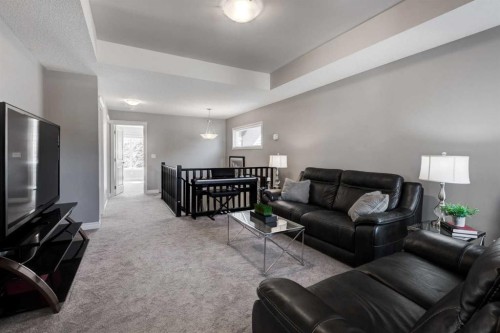 255 Riviera Way, Cochrane, AB - Indoor Photo Showing Living Room