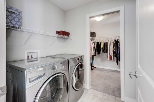 255 Riviera Way, Cochrane, AB - Indoor Photo Showing Laundry Room