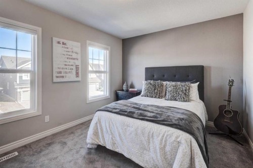 255 Riviera Way, Cochrane, AB - Indoor Photo Showing Bedroom