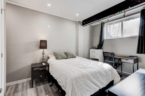 255 Riviera Way, Cochrane, AB - Indoor Photo Showing Bedroom