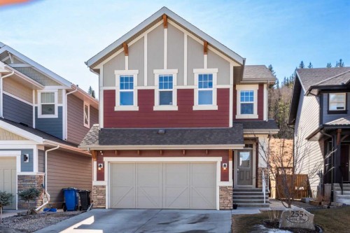 255 Riviera Way, Cochrane, AB - Outdoor With Facade