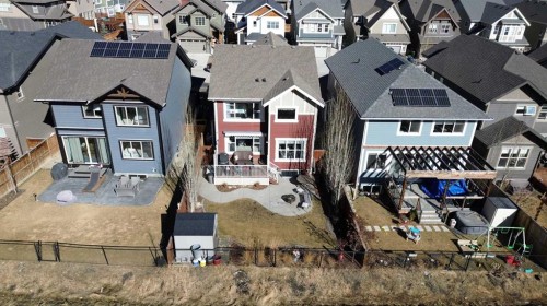 255 Riviera Way, Cochrane, AB - Outdoor With Facade